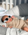 8. Potret gemas Baby Qwenzy saat berjemur mengenakan kacamata