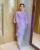 1. Gunakan kebaya berwarna ungu cantik