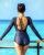 4. Menikmati pemandangan laut baju renang hitam biru backless model
