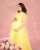 9. Tampil gaun kuning, penampilan Momo mengingatkan kepada Princess Belle