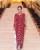 13. Krisdayanti mengenakan kebaya merah hiasan Swarovski