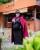 4. Bella Shofie mengenakan dress hitam dibalut blazer berwarna fuchsia