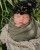 1. Potret Baby Kiro mengenakan topi adat Bali